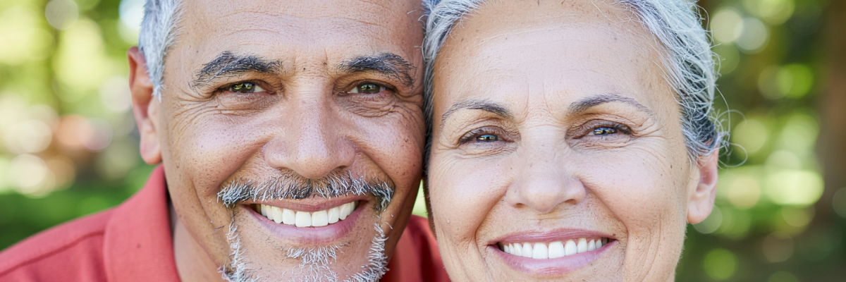 An older couple considering smiles club clear braces.